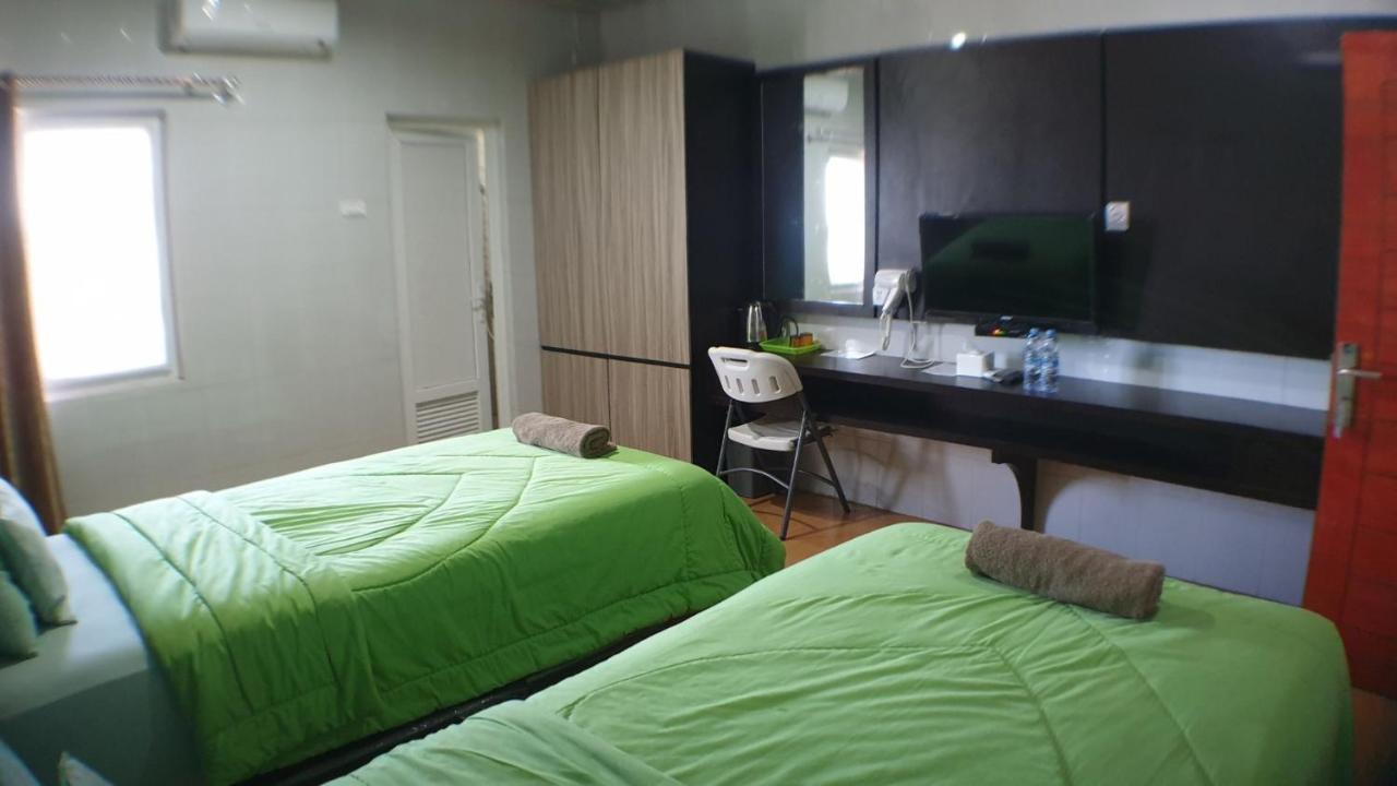 Nasional Hotel Гунунгситоли Экстерьер фото