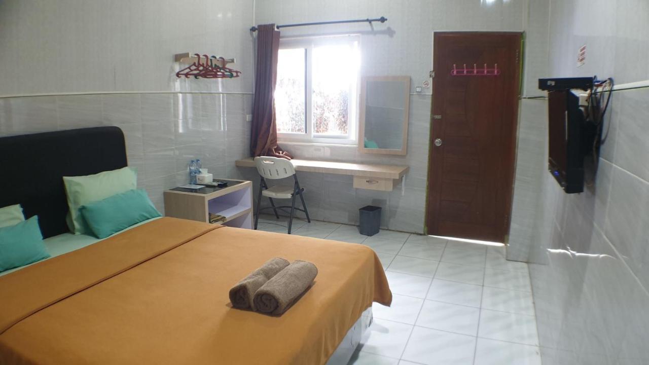Nasional Hotel Гунунгситоли Экстерьер фото