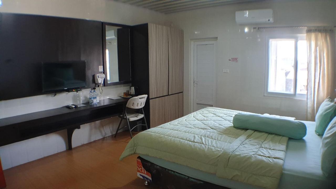 Nasional Hotel Гунунгситоли Экстерьер фото
